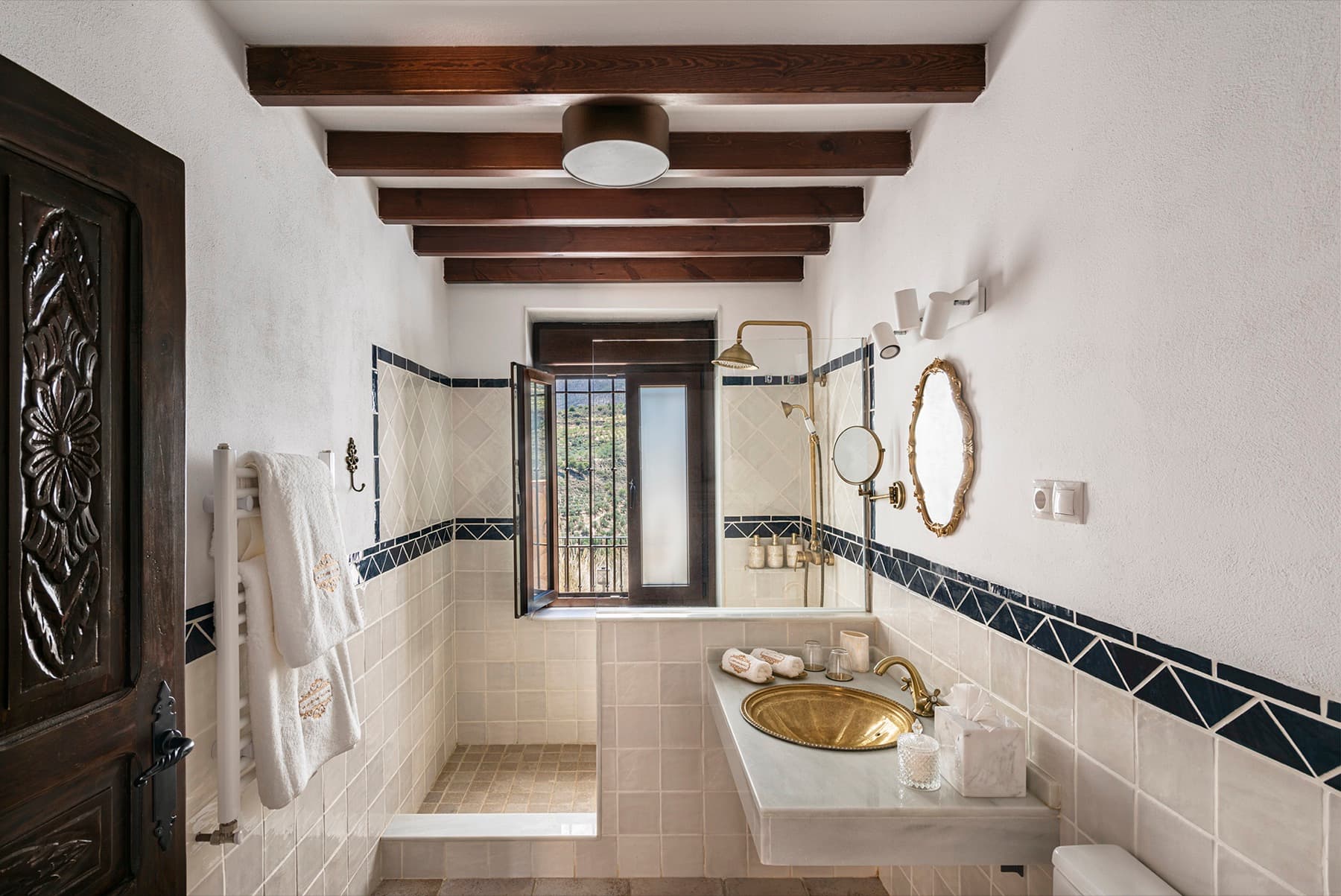 Baño con ducha de obra